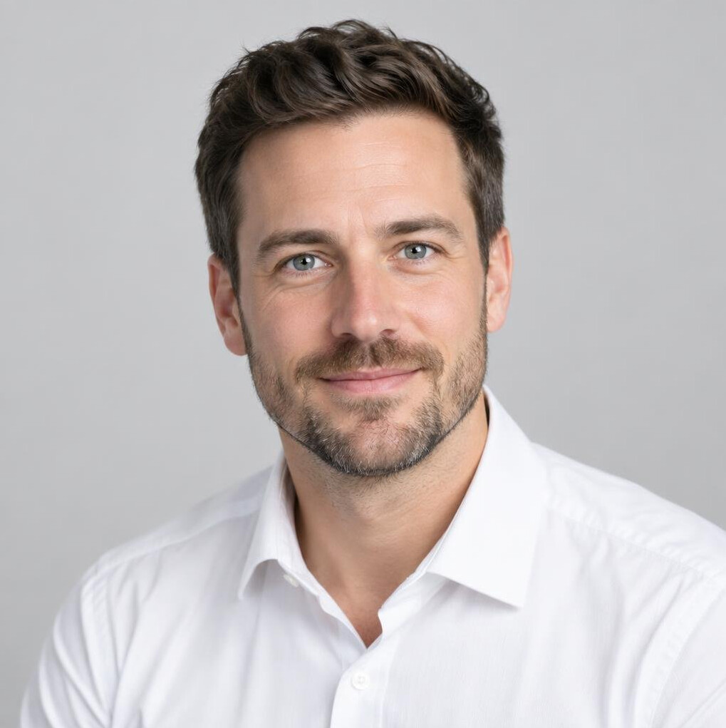 Studio portrait of a man in his 30s with a beard
