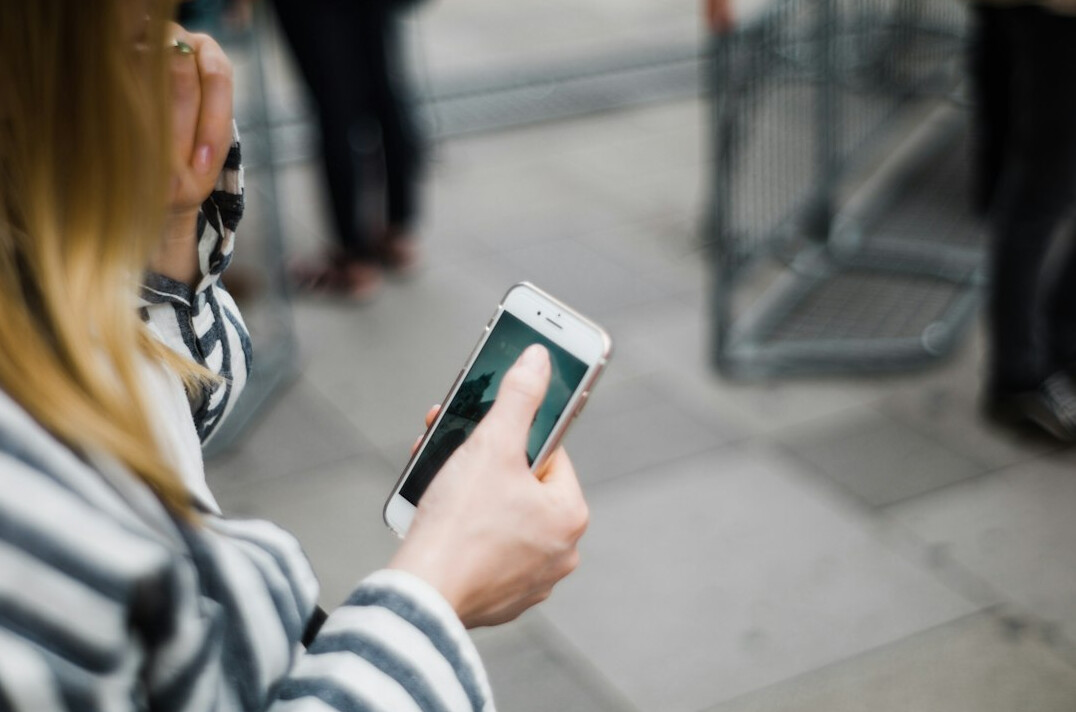 people reading news on phone